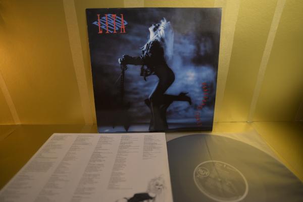 LITA FORD - Dangerous Curves